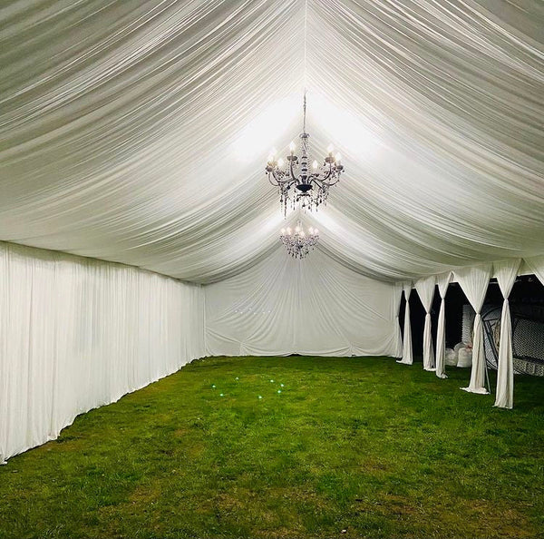 TENT with DRAPING  20x70 & Chandeliers